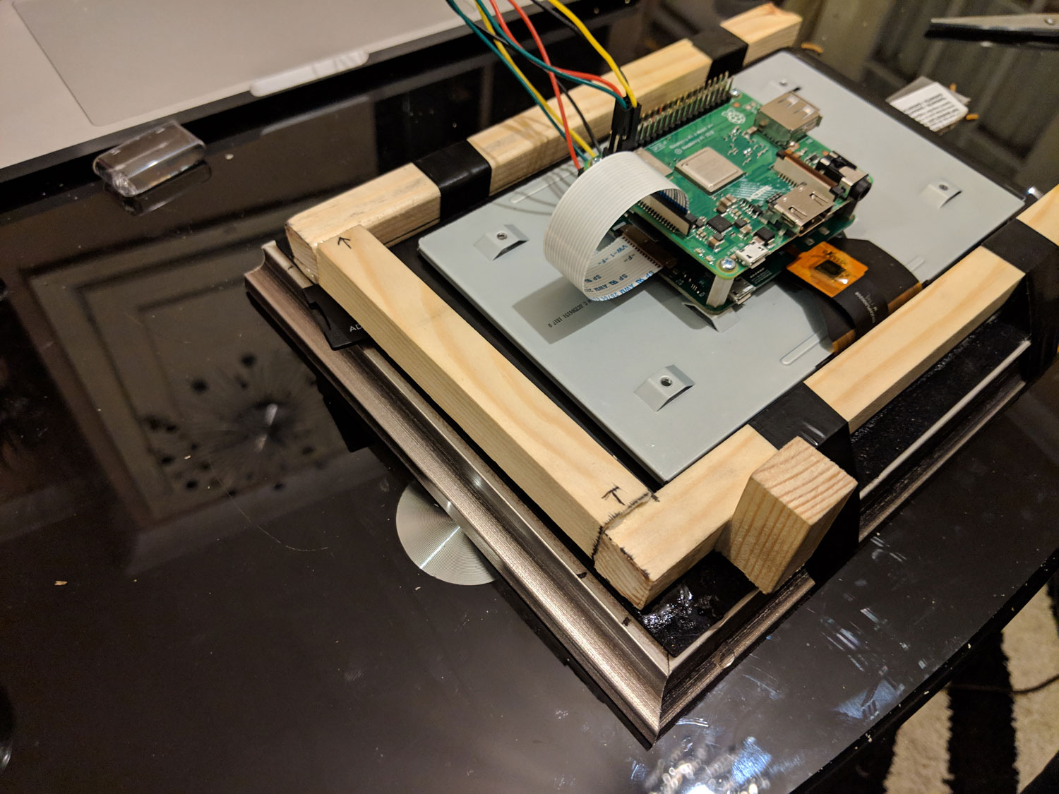 An image of the construction of the frame holding in the Raspberry Pi.